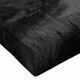 Close-up of a stretched canvas wall art piece showcasing a vibrant landscape with windmills, featuring rich colors and detailed brushwork, perfect for home decor.