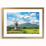 Framed wall art collection featuring a serene landscape with windmills, gold matting, and elegant design, perfect for enhancing home decor and ambiance.