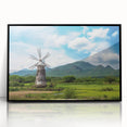Framed acrylic wall art showcasing a scenic landscape with windmills, featuring a black frame and a modern design, ideal for enhancing home decor.