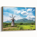 Framed canvas wall art showcasing a serene landscape with windmills, featuring a gold frame and side view, ideal for home decor and aesthetic enhancement.