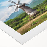 Rolled canvas wall art showcasing a serene landscape with windmills, featuring vibrant colors and intricate details, ideal for home decor and aesthetic enhancement.