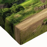 Close-up of a stretched canvas wall art piece showcasing a vibrant landscape with windmills, featuring rich colors and intricate details, ideal for home decor.