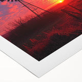 Rolled canvas artwork showcasing a vibrant landscape with windmills under a colorful sunset, ideal for home decor and artistic wall displays.