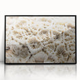 Framed wall art featuring a vibrant marine life coral design in bold colors, set in a sleek black frame, perfect for ocean-themed decor.