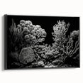 Framed canvas wall art showcasing a vibrant marine life coral design with colorful corals and fish against a black background, perfect for ocean-themed decor.