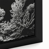 Close-up of a vibrant coral reef design wall art piece, featuring rich colors and intricate marine life details, framed and ready for display in any home decor. Ideal for ocean enthusiasts and artists alike, this canvas adds a dynamic touch to any interior space.