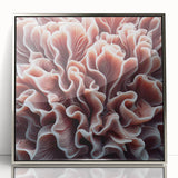 Framed acrylic wall art showcasing vibrant marine life and coral designs, featuring a sleek silver frame, ideal for coastal-themed decor.