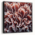 Framed canvas wall art showcasing a vibrant marine life coral design in a sleek black frame, ideal for adding a touch of oceanic beauty to any home decor.