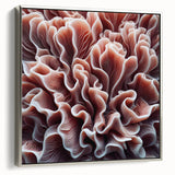 Framed wall art featuring a vibrant coral reef design, showcasing intricate marine life details in a silver frame, perfect for ocean-themed decor.