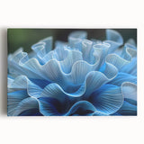 Vibrant coral reef wall art on stretched canvas, showcasing intricate marine life details in blues and oranges, perfect for ocean-themed decor.