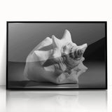 Framed wall art featuring a vibrant marine life coral design, showcasing intricate colors and details, set against a sleek black frame for elegant decor.