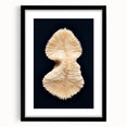 Framed marine life wall art featuring a vibrant coral design, set in an elegant black frame with a mat, perfect for ocean-themed decor in any room.