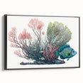Framed wall art featuring a vibrant coral design, showcasing colorful marine life in a black frame, ideal for ocean-themed decor and enhancing living spaces.