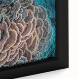 Close-up of a framed canvas wall art piece showcasing vibrant marine life and coral designs, emphasizing intricate details and vivid colors, perfect for ocean-themed decor.