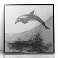 Framed wall art featuring a vibrant dolphin design, showcasing marine life in vivid colors against a black background, perfect for ocean-themed decor.