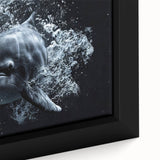 Framed canvas wall art featuring a vibrant close-up design of playful dolphins swimming in a blue ocean, showcasing intricate details and textures that enhance marine life decor.