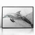 Framed acrylic wall art featuring a vibrant dolphin design, showcasing marine life in shades of blue and black, perfect for ocean-themed decor.