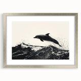 Framed wall art collection showcasing a vibrant dolphin design, featuring a silver frame and mat, perfect for marine-themed decor in any setting.