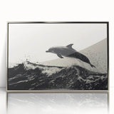 Framed wall art showcasing a silver-accented dolphin design, perfect for marine life enthusiasts. Ideal for home decor, it adds a vibrant touch to any space.