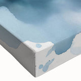 Close-up view of a stretched canvas wall art featuring a vibrant dolphin design, showcasing intricate details and vivid colors, perfect for marine life enthusiasts.