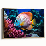Framed canvas wall art featuring a vibrant marine life fish design with gold accents, showcased from a side view, perfect for ocean-themed decor.