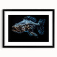Framed wall art featuring a vibrant marine life fish design in a black frame with a mat, showcasing colorful ocean fish against a blue background, ideal for enhancing coastal decor.