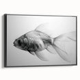 Framed canvas wall art showcasing a vibrant marine life fish design in bold colors, viewed from the side against a black backdrop, ideal for ocean-themed decor.