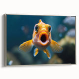 Framed canvas wall art showcasing a vibrant marine life fish design in colorful hues, featuring a sleek silver frame, ideal for ocean-themed decor.