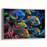 Framed wall art collection showcasing a marine life fish design in vibrant colors, featuring a sleek silver frame and perfect for coastal-themed decor.