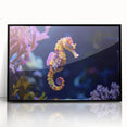Framed wall art showcasing a vibrant marine life fish design in acrylic, featuring a sleek black frame, perfect for aquatic-themed decor in contemporary settings.