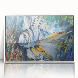 Framed wall art featuring a vibrant marine life fish design with colorful aquatic creatures, displayed in a sleek white frame, perfect for ocean-themed decor.