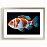 Framed wall art showcasing a vibrant marine life fish design with a silver mat, ideal for coastal-themed decor, enhancing any living space with underwater elegance.