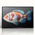 Framed wall art featuring a vibrant marine life fish design in shades of blue and green, set against a sleek black frame, perfect for ocean-themed decor.