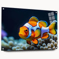 Vibrant wall art design showcasing colorful marine life and fish, displayed in a sleek acrylic frame with decorative pins, perfect for ocean-themed decor.