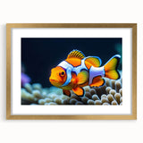 Framed wall art featuring a vibrant marine life fish design in gold, showcasing colorful fish against a textured background, ideal for ocean-themed decor.
