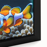 Vibrant close-up of a framed canvas wall art piece depicting a colorful marine life fish design, showcasing intricate details and vivid colors, perfect for ocean-themed decor.