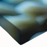 Close-up of a vibrant marine life canvas print showcasing intricate fish designs in shades of blue and green, perfect for ocean-themed decor and art enthusiasts.