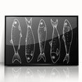 Framed wall art featuring a vibrant marine life fish design, showcasing colorful aquatic species on a black background, perfect for ocean-themed decor.