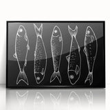 Framed wall art featuring a vibrant marine life fish design, showcasing colorful aquatic species on a black background, perfect for ocean-themed decor.