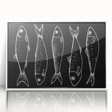 Framed wall art featuring a vibrant marine life fish design in blue and white, showcasing intricate details and textures, perfect for ocean-themed decor.