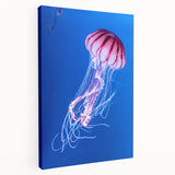 Stretched canvas wall art featuring a vibrant jellyfish design in shades of blue and purple, showcasing marine life elegance and adding a tranquil oceanic touch to any space.