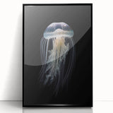 Framed wall art featuring a vibrant jellyfish design with blue and purple hues, set in a sleek black frame, perfect for marine life enthusiasts and modern decor.