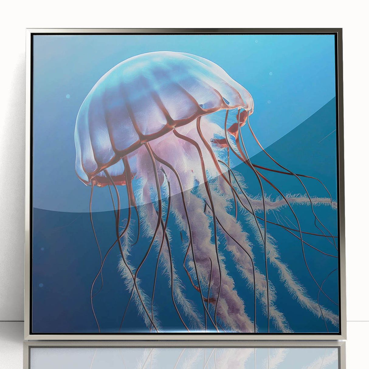 Framed acrylic wall art featuring a vibrant jellyfish design in hues of blue and purple, set in a sleek silver frame, ideal for marine-themed decor.