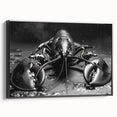 Framed wall art featuring a detailed lobster design in vibrant colors, showcasing marine life with a sleek black frame, perfect for ocean-themed decor.