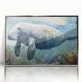 Framed wall art showcasing a vibrant marine life design featuring a manatee, presented in a sleek silver frame, ideal for ocean-themed decor.