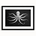 Black-framed wall art showcasing a vibrant octopus design, perfect for marine life enthusiasts. Ideal for adding a coastal touch to any room decor.