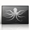 Framed acrylic wall art showcasing a striking octopus design with vibrant colors against a black background, perfect for marine-themed home decor.