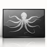 Framed acrylic wall art showcasing a striking octopus design with vibrant colors against a black background, perfect for marine-themed home decor.