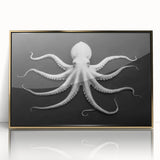 Framed wall art featuring a vibrant octopus design, showcasing intricate marine life details and a sleek gold frame, perfect for coastal-themed decor.