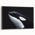 Framed wall art featuring a striking black and white orca design on textured canvas, showcasing marine life theme, ideal for ocean lovers' decor.